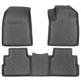 Four-piece black rubber car floor mat set with textured non-slip patterns, shown on a plain white background.