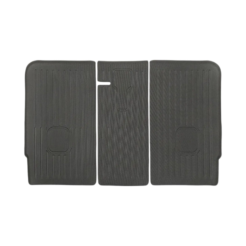 Three-piece dark gray molded rubber car floor mat set with textured ribbed patterns and circular cutouts, shown on a plain white background.